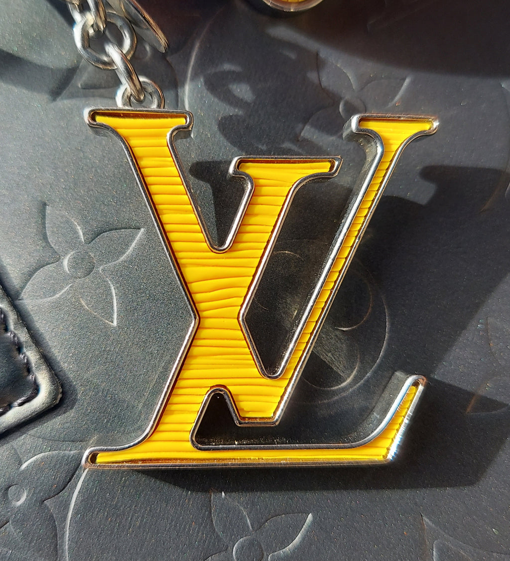 SOLD! LOUIS VUITTON Yellow Silver Fleur D'Epi Bijoux Sak LV Logo Keychain Charm